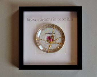 Pictureframe broken dreams in porcelain black