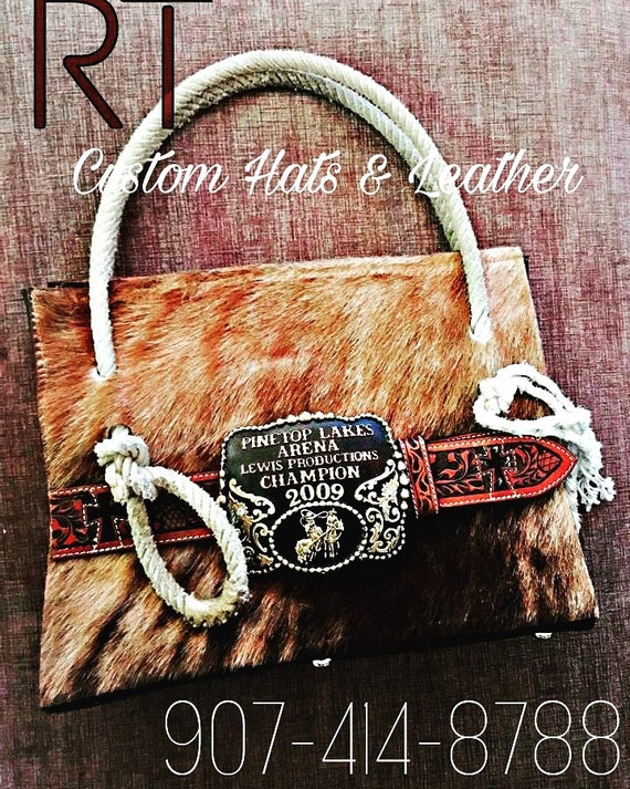 Items similar to Original cowhide trophy buckle purse on Etsy