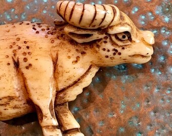 Bead #8...Water Buffalo bead, carved bone