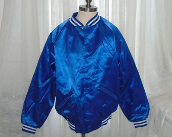 Custom Made Satin Jackets The monochrome look with a silk jacket is easily done with blue, white, black, navy or any other basic color. Select a dress coat and slacks or a skirt in the same material and color. With satin, stick with other shiny fabrics, such as silk or rayon.