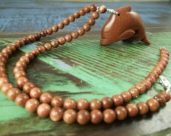 Dolphin Necklace, Carved Stone Dolphin Necklace, Brown Necklace, Goldstone Necklace