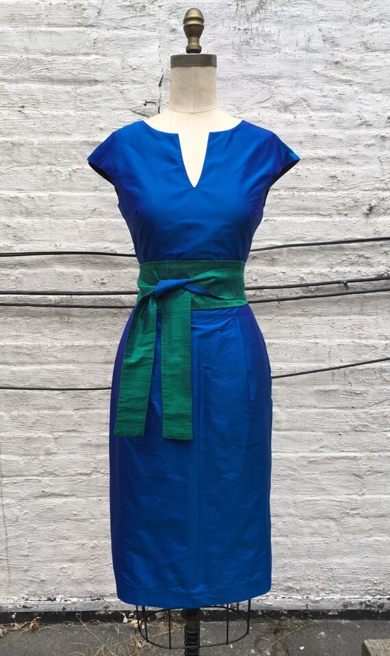 turquoise cap and gown