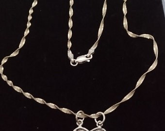 Vintage boxed sterling silver Friends necklace