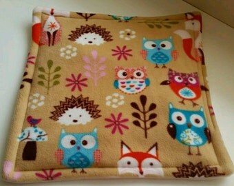 Guinea pig waterproof lap pad woodlands fleece