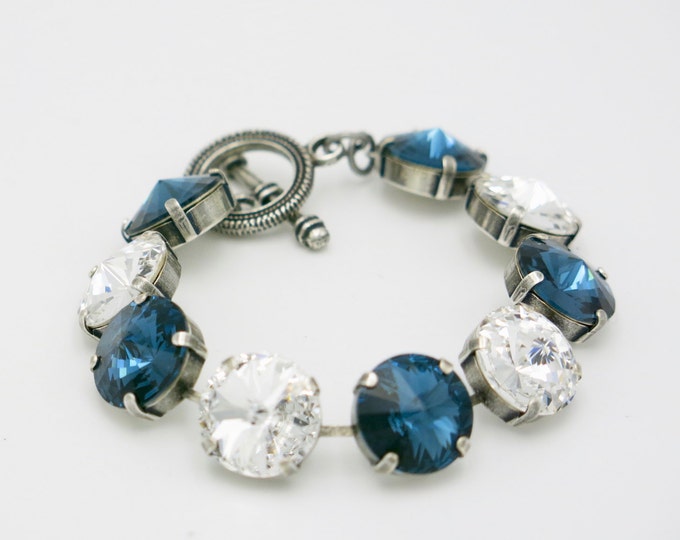 Bold Statement Jewelry! Intense brilliance genuine Swarovski crystal tennis bracelet in Montana blue and clear crystal rivoli stones.