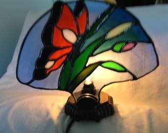 Stained glass monarch butterfly fan lamp.
