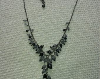 1990's, vintage, black and grey necklace, set in a silver tone.