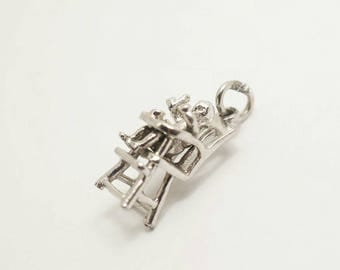 Vintage Sterling Movable Baby in a Highchair Charm