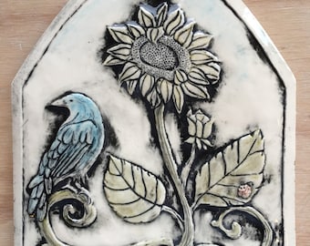 Sunflower and bluebird porcelain arch tile in gloss finish for installation or wall hanging