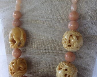 CHINESE CARVED BONE beads, orange jade beads, Tibetan silver charm, unique and rare Chinese Asian necklace.