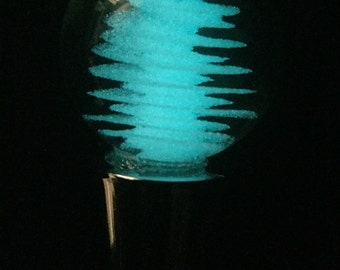 Glow Twist Winetopper - Glow in the dark twist inside of a glass marble winetopper