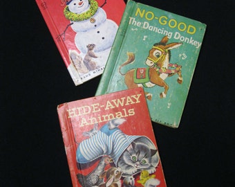 Rand McNally Junior Elf Books, '44, '57 and 1977, The Christmas Snowman, No-Good The Dancing Donkey, and Hide- Away Animals, 5" X 6.5"