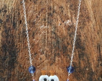 Gliding swans necklace