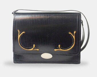 cocó,handbag,leatherbag,blackbag,valise pocket,tote,diaperbag