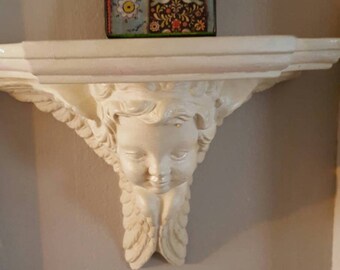 Shabby Cottage Cherub Wall shelf.....Ceramic....Creamy white
