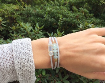 Wrap bracelet with genuine Quartz Crystal - grey suede lace -glass beads - gold accents