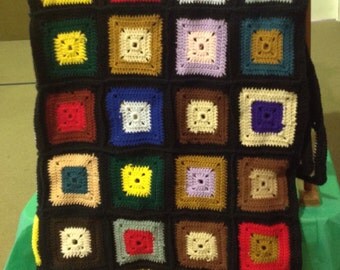 Black and multicolor granny square afghan
