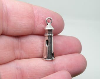 5 Silver Tone Lighthouse Charms. B-007