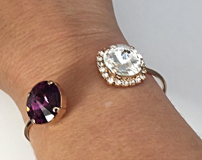 Spring 2017 trend! Stylish open cuff bangle that features one purple amethyst and one clear Swarovski® crystal rivoli stones