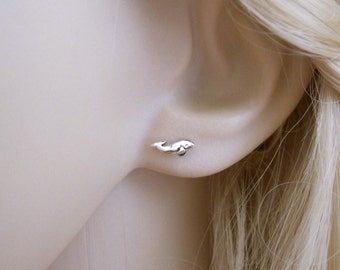 A pair of tiny WHALE sterling silver stud earrings