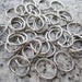 NEW 100 Qty. - 11mm x 13.5mm OD, 14g (1.4mm) Machine Cut Stainless Steel Oval Jump Rings OJR14-11-135