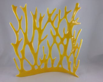 Yellow glass standing sea grass sculpture