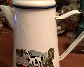 Vintage enameled pot French white color with flowers of the 1970s patterns