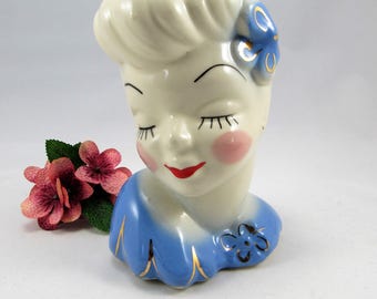 Very Pretty Mid Century Glamour Girl Lady Head Vase with Blue Dress, Red Lips , Flower and Gold Trim, The Head Vase is 5 3/4" Tall.