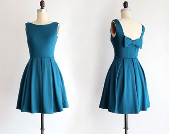 JANUARY | Teal bridesmaid dress with bow. vintage inspired cocktail dress. pleated skirt party dress. retro mod bridesmaids dress