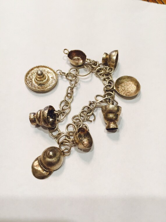 1940s Sterling Silver Mexican Charm Bracelet For Sale at 1stDibs