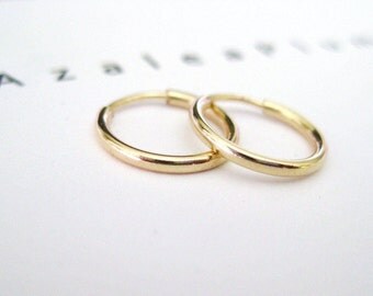 14k Solid Gold Hoop Earrings. Dainty Mini Hoop Earrings. Delicate Skinny Gold Hoops. Dainty Hoops. Timeless Earrings. 14k Solid Gold Hoops