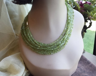 Nine strand peridot designer made necklace