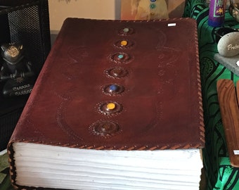 Massive leather chakra journal with handmade paper.