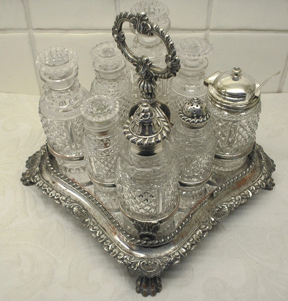 Cruet set 8 piece cut glass lead crystal. Regency 1830 later