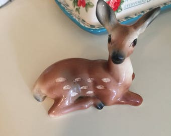 laying deer figurine