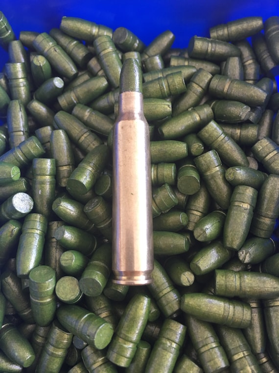 500 223/556 55gr cast bullets coated with hitek coating green