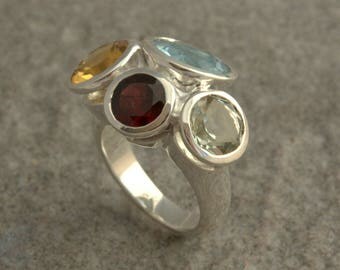 Sterling silver ring with faceted differents stones