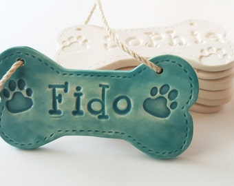 Dog Bone Christmas Ornament with Name and Paw Print Personalized Dog Ornament Clay Custom Made to Order Personalized Ceramic Dog Bone