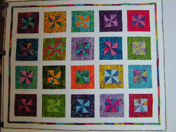 Batik Pinwheel Quilt White Background Multi Colored