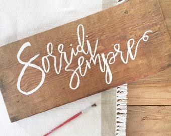 Custom calligraphic antique wood sign