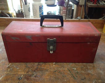 Vintage red metal toolbox