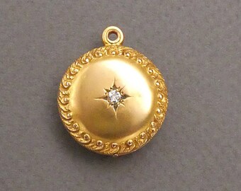 Rare 14K diamond locket- slides side to side