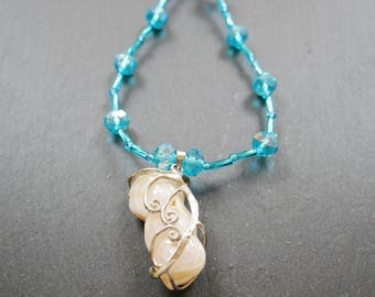 Aqua crystal bead necklace with free form Mother-of-Pearl pendent