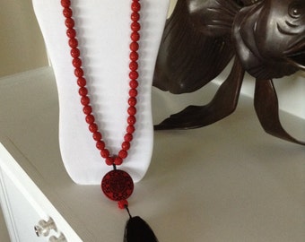 Beautiful 34" Red Chinese Cinnabar Necklace With 3" Black Silk Tassel.