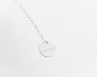 Custom silver disc necklace. sterling silver. mirror finish. personalized silver coin. customized hand stamped jewelry.