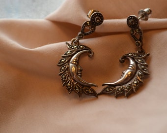 Dreamy and whimsical vintage sterling silver crescent moon drop earrings set with Marcasite