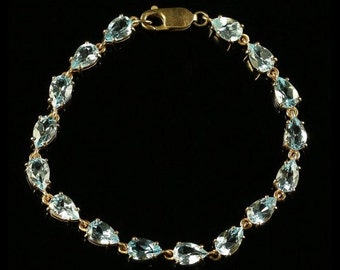 Blue Topaz 9ct Yellow Gold Bracelet Over 12ct of Topaz