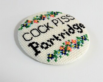 Large Cross Stitch Alan Partridge Badge with Flowers // Hand stitched customized pin by Sarah Fordham
