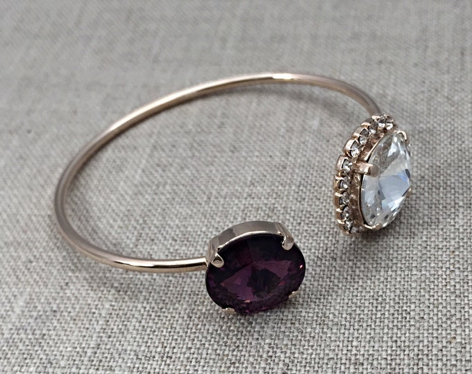 Spring 2017 trend! Stylish open cuff bangle that features one purple amethyst and one clear Swarovski® crystal rivoli stones