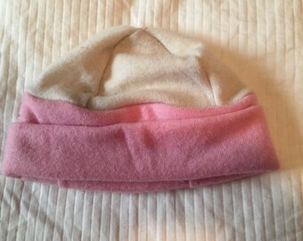 100% cashmere hat, machine washable and dryable, one size fits most